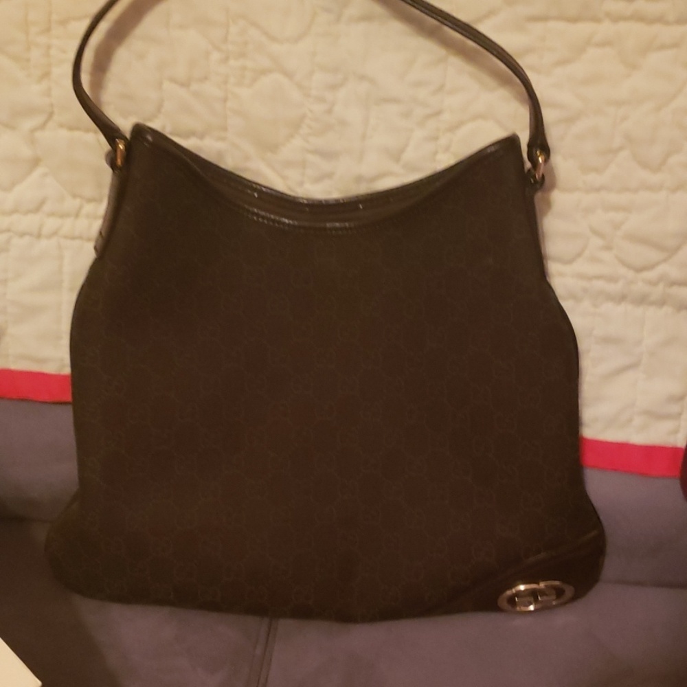 Brown Gucci, monogram Hobo. Gold Accents.